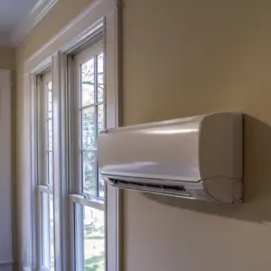 Ductless mini-split air conditioner installed in a modern living room